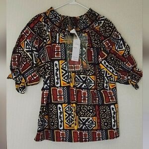 Look At Me Citi Trends Women's Plus Size Geometric Shapes & Colors Tunic Top.
